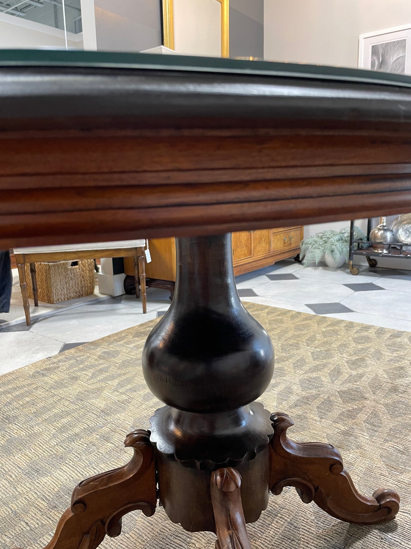 Carved antique pedestal table